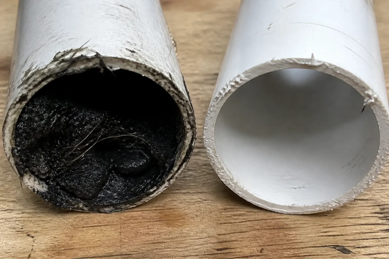 Grease-packed pipe next to a hydro-jetted drain in Tampa Grease-packed pipe next to a hydro-jetted drain in Tampa